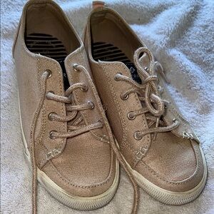 Stylish Kids Sperry sneakers in rose gold.